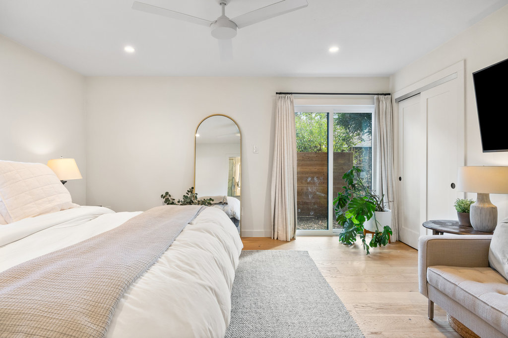 4618 Trail Crest Circle Austin, TX 78735 - Photo 25 of 40 a bedroom with furniture and a window