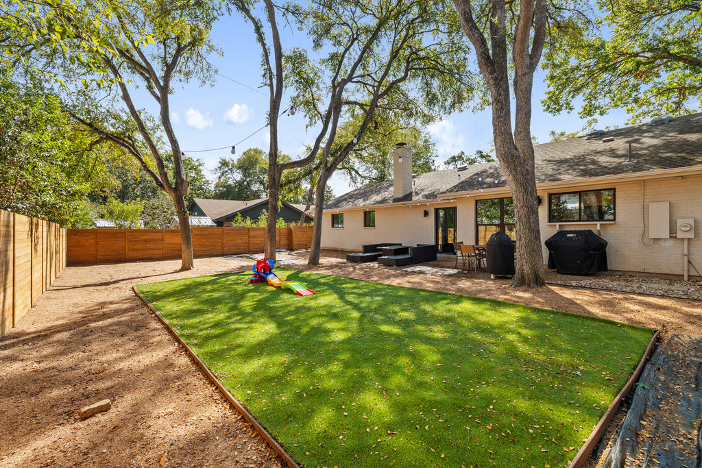 4618 Trail Crest Circle Austin, TX 78735 - Photo 34 of 40 a view of a backyard with a patio