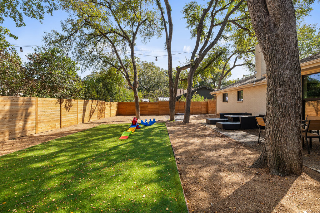 4618 Trail Crest Circle Austin, TX 78735 - Photo 36 of 40 a view of a backyard with tree
