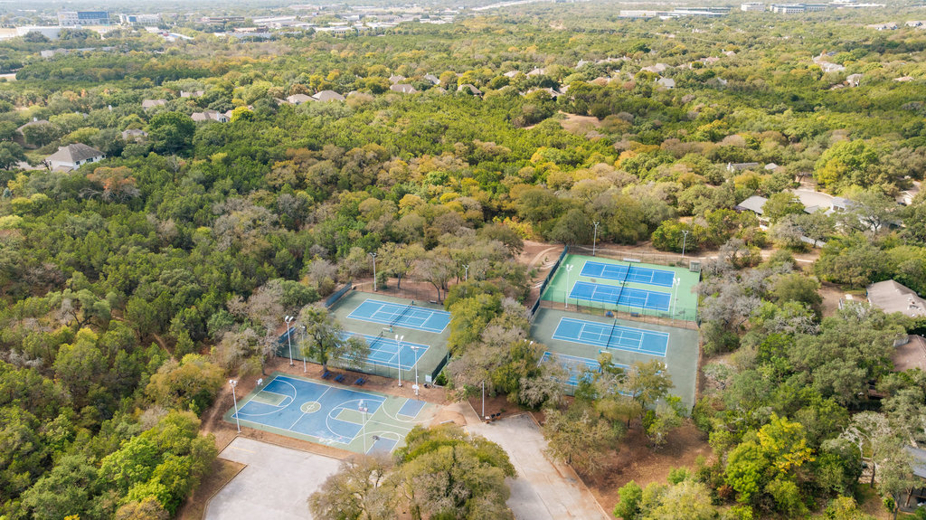 4618 Trail Crest Circle Austin, TX 78735 - Photo 40 of 40 a view of a city with lush green forest