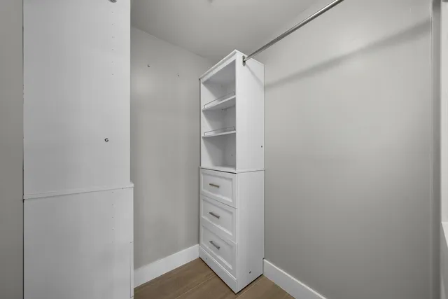 a view of an empty walk in closet