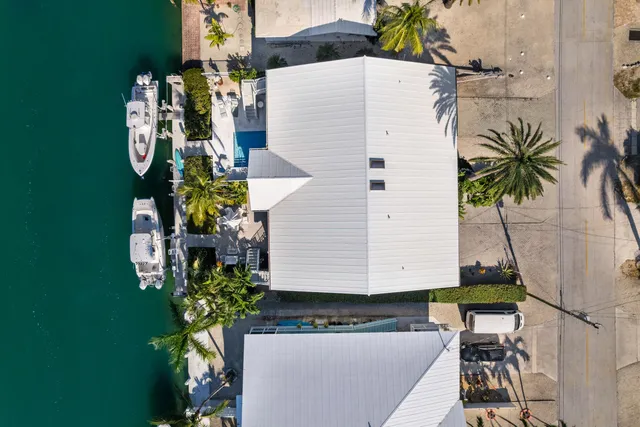 a white house with a white table and chairs