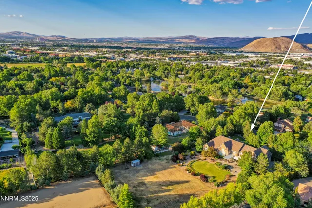 a view of a city with mountains in the background