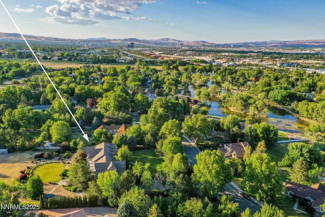 a view of a house with a park