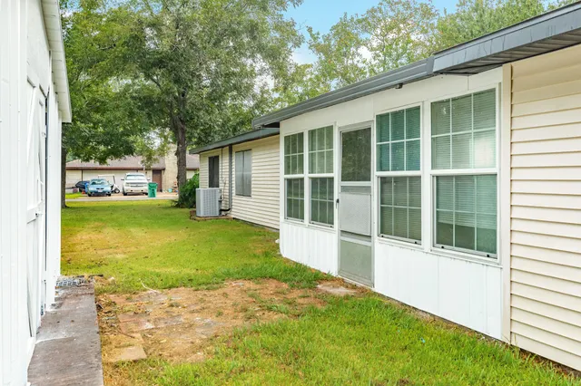 a view of a backyard with a large window