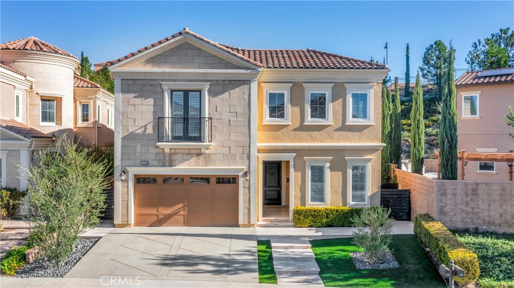 12024 North Ricasoli Way Porter Ranch, CA 91326 - Photo 1 of 1 front view of house with a yard