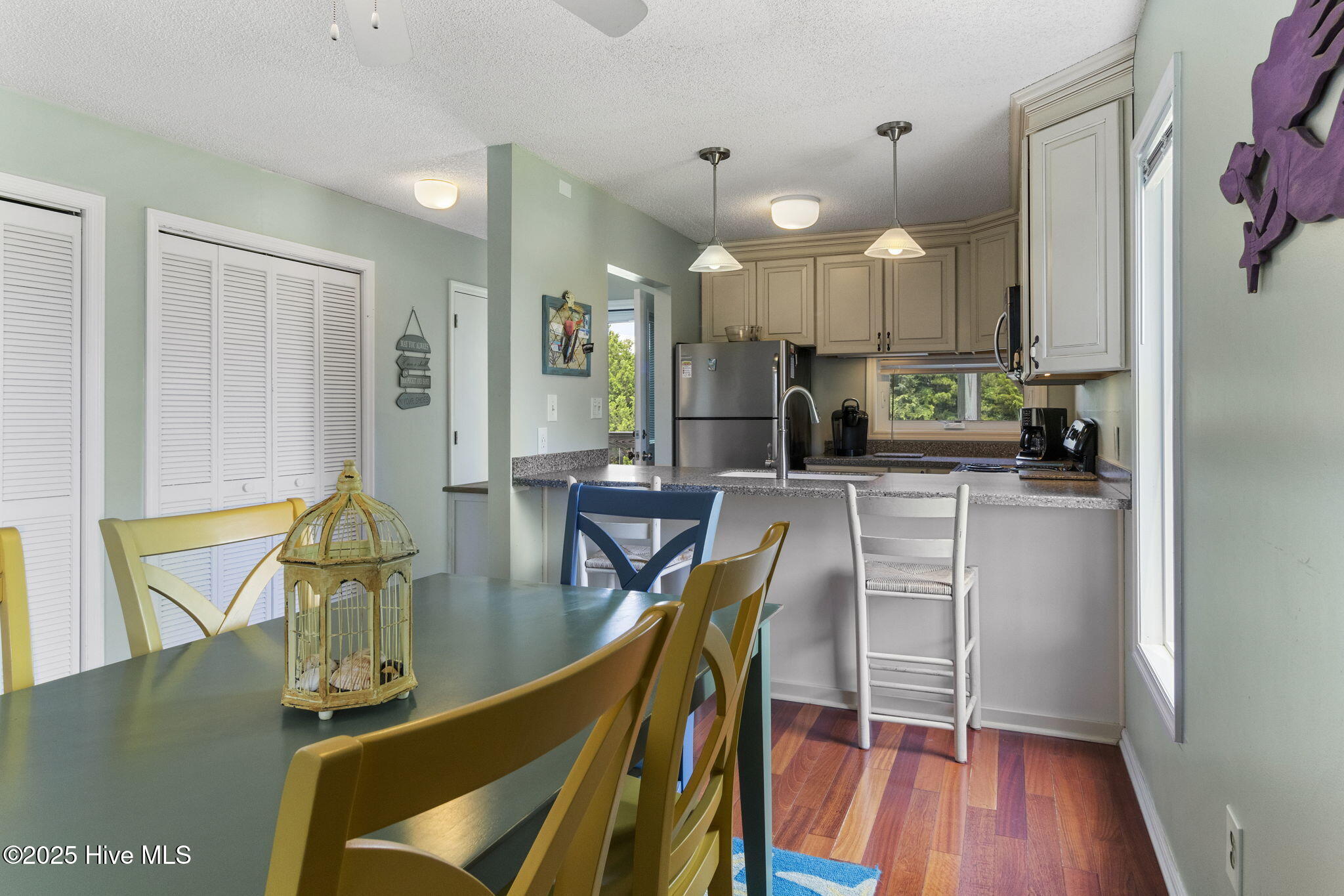 8801 Reed Drive, Unit 105N Emerald Isle, NC 28594 - Photo 14 of 37 Dining Area and Kitchen