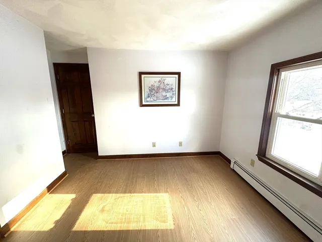 a view of a room with a large window