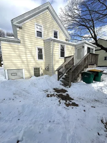a front view of a house with yard