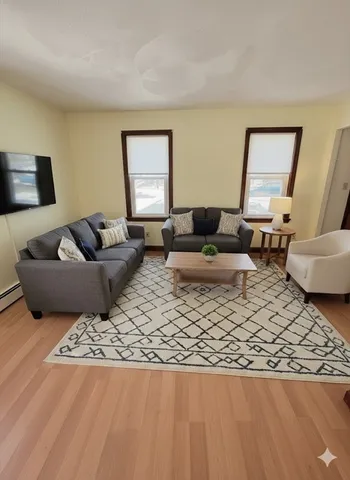 a living room with furniture and a couch