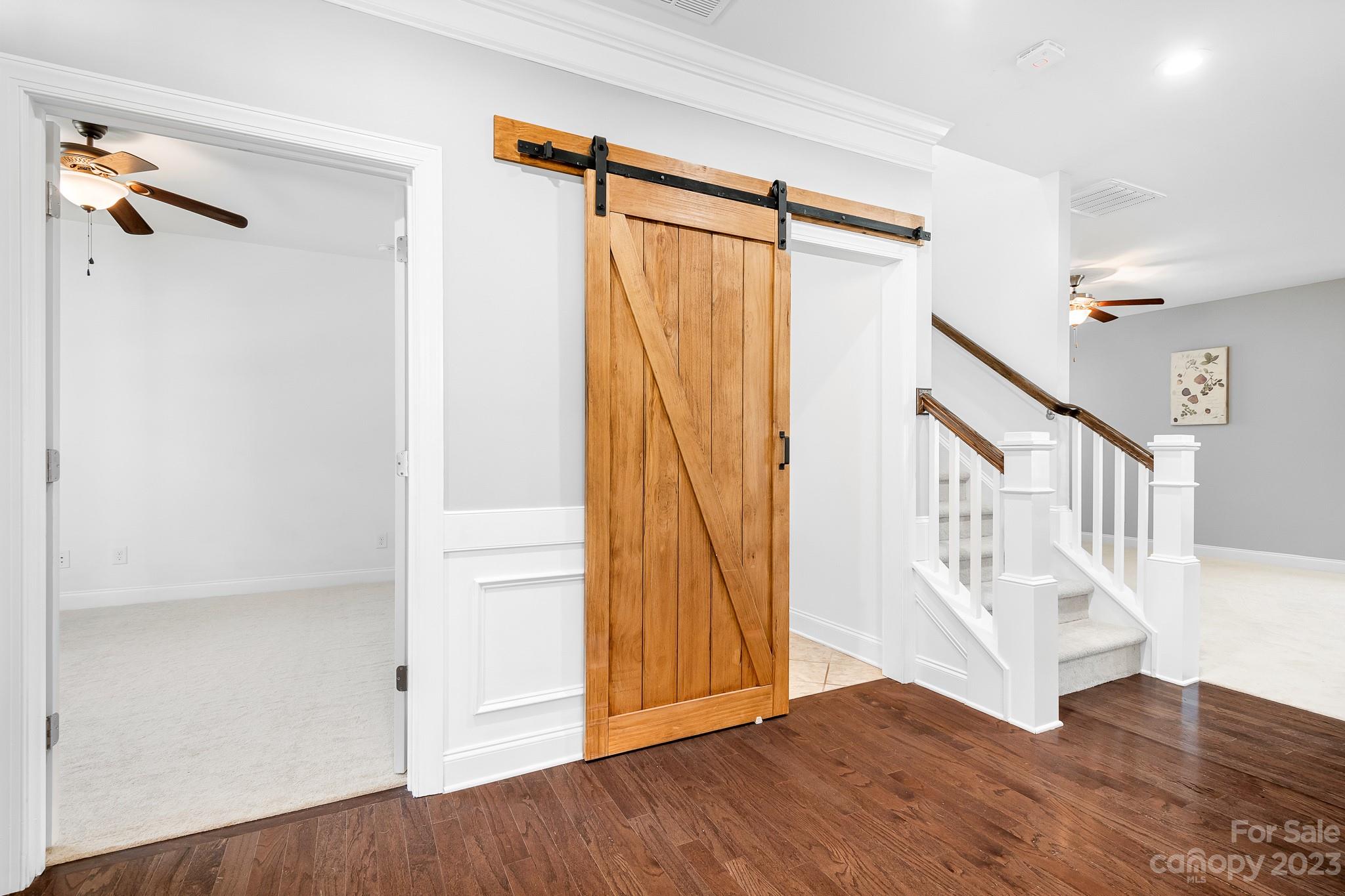 3329 Lucy Drive Monroe, NC 28110 - Photo 8 of 28 a view of an entryway with wooden floor