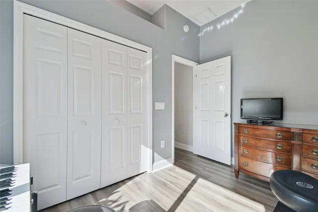 a bathroom with a sink a mirror and a vanity