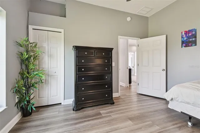 a bathroom with a toilet a sink and a mirror