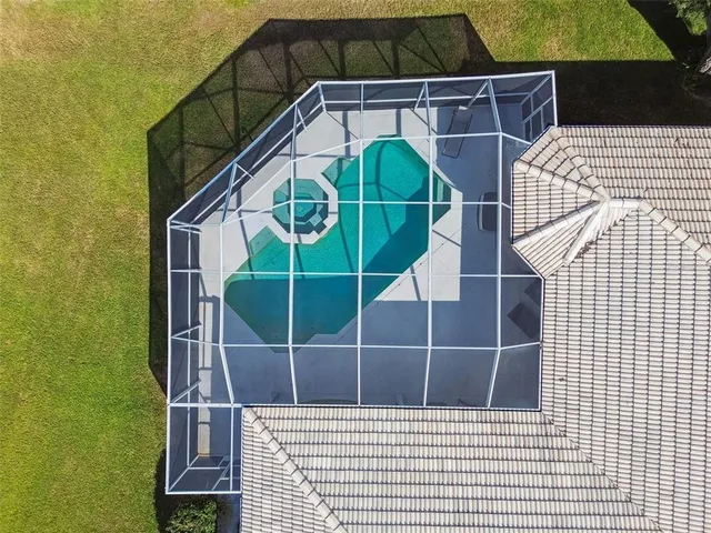 a view of front door of a house with a yard