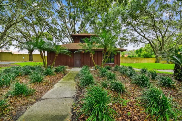 a view of swimming pool with a garden