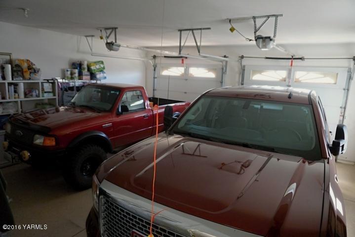 767 East Charron Road Moxee, WA 98936 - Photo 23 of 24 a car parked in a garage