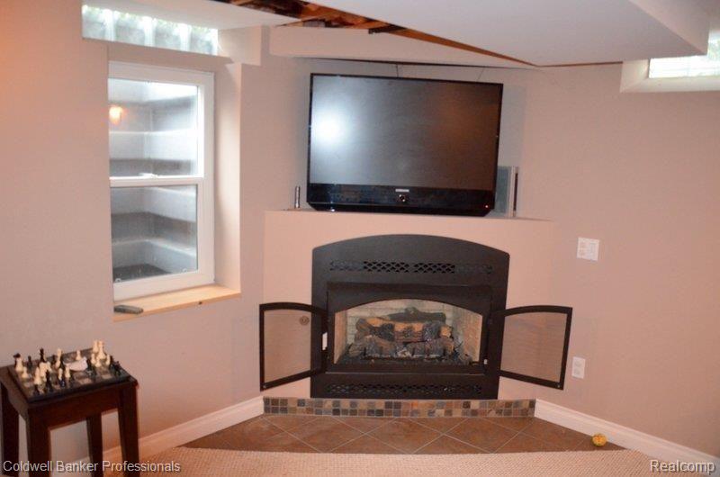 31245 Old Stage Road Franklin, MI 48025 - Photo 16 of 21 gas fpl and egress window