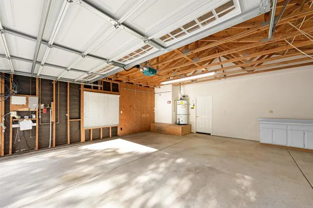 a view of a room with wooden walls