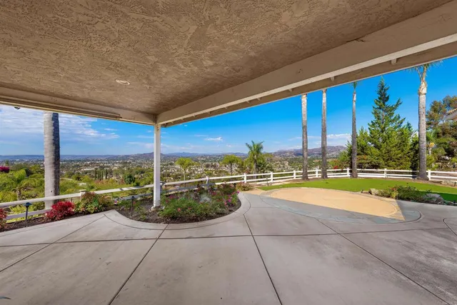 a view of swimming pool with outdoor space and living room