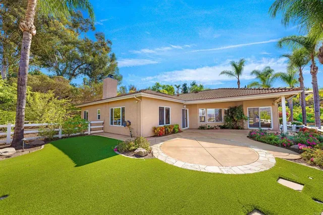 a view of a house with a swimming pool