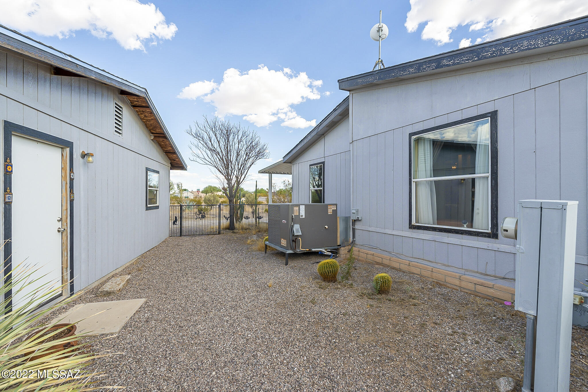 5285 North Puma Road Marana, AZ 85653 - Photo 43 of 46 a view of a house with backyard