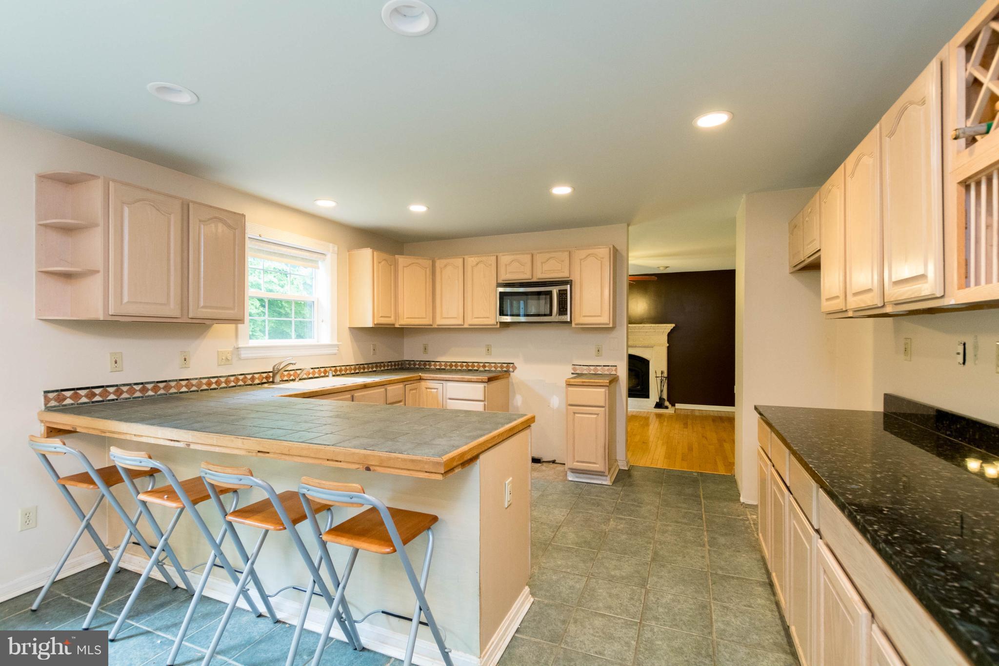 3260 Ady Road Street, MD 21154 - Photo 3 of 30 Kitchen with Tile & Granite Counters