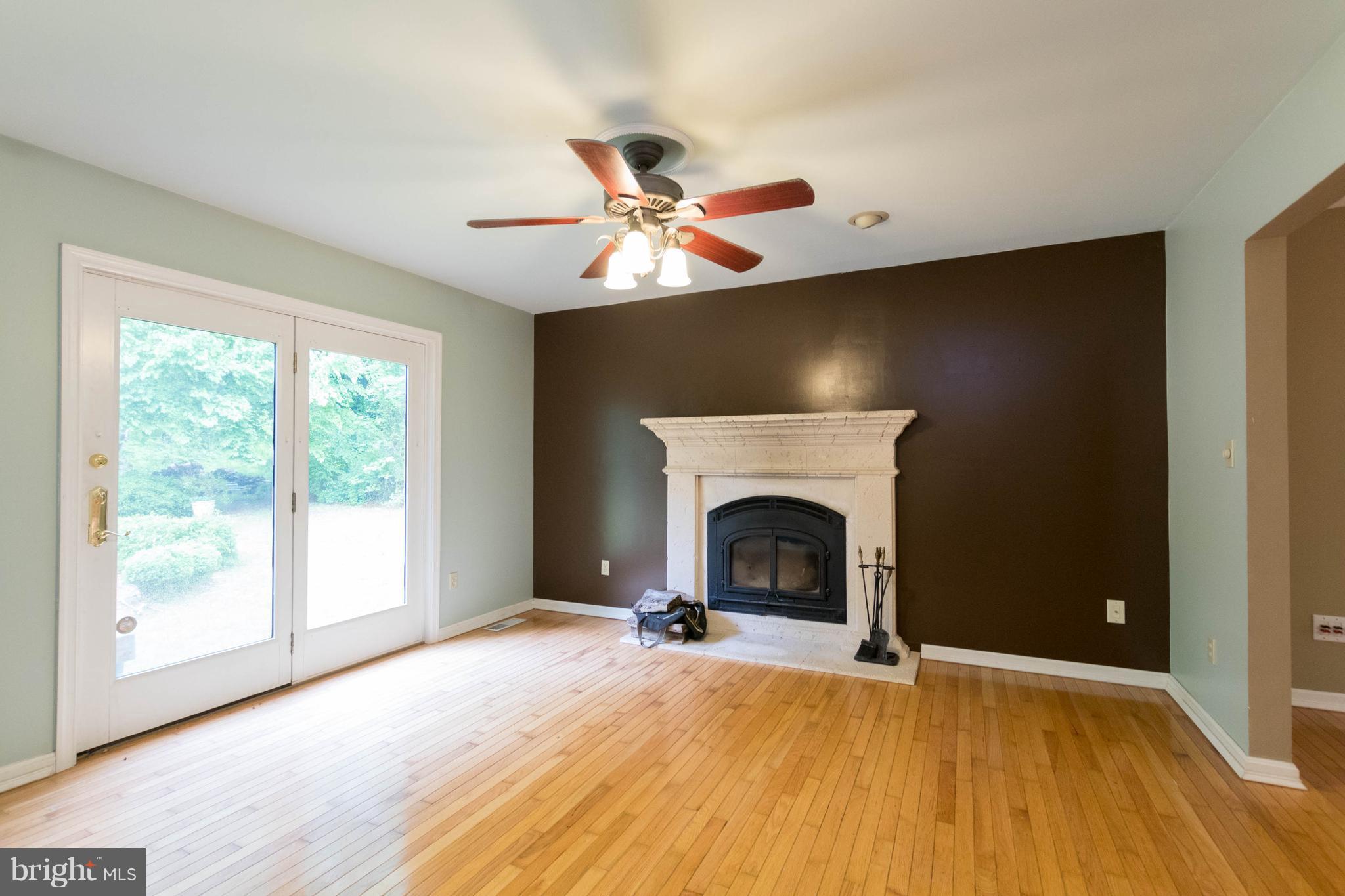 3260 Ady Road Street, MD 21154 - Photo 6 of 30 Dining Room, Fireplace with Wood Stove Insert