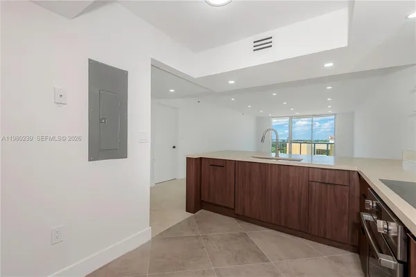 a view of kitchen with wooden floor