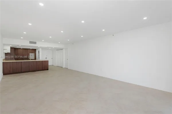 a view of kitchen and a window