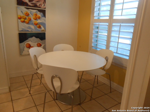 2300 Nacogdoches Road, Unit 118E San Antonio, TX 78209 - Photo 12 of 35 a view of a room with furniture and window