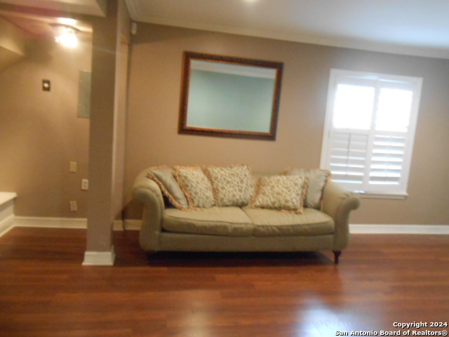 2300 Nacogdoches Road, Unit 118E San Antonio, TX 78209 - Photo 16 of 35 a living room with furniture and a wooden floor