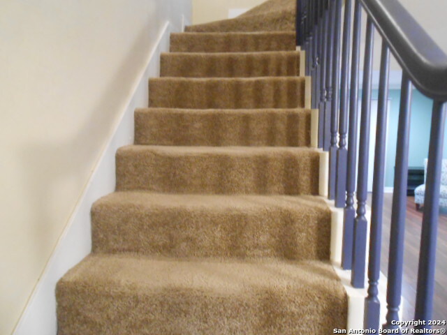2300 Nacogdoches Road, Unit 118E San Antonio, TX 78209 - Photo 22 of 35 a large white bed sitting in a bathroom next to a window