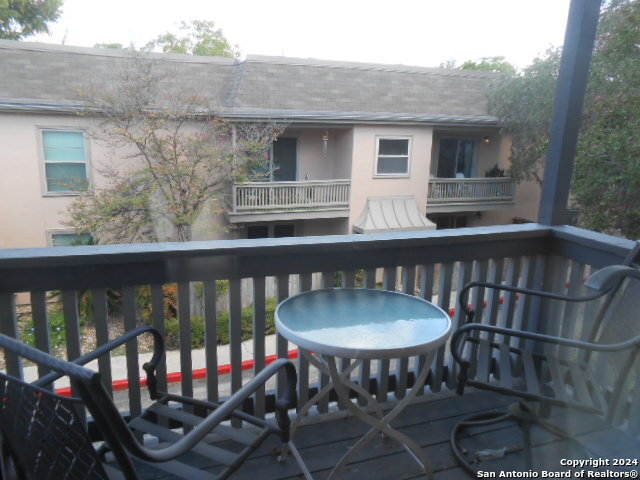 2300 Nacogdoches Road, Unit 118E San Antonio, TX 78209 - Photo 32 of 35 a view of a balcony dining area