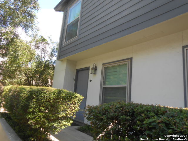 2300 Nacogdoches Road, Unit 118E San Antonio, TX 78209 - Photo 34 of 35 a view of a house with a garden