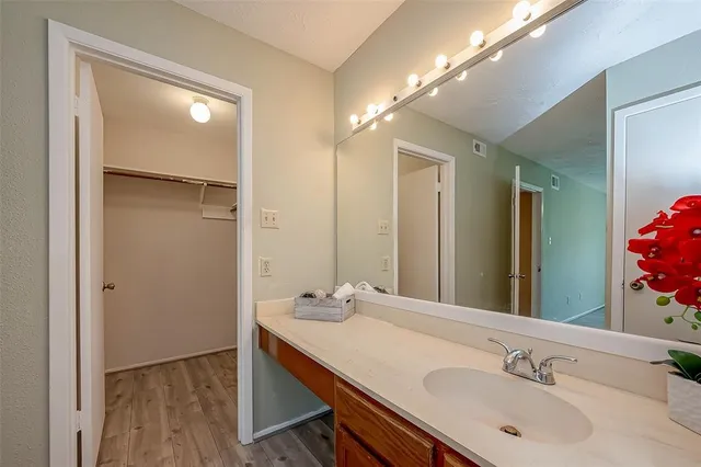 a bathroom with a bathtub and shower