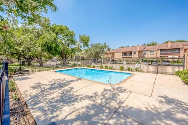 a view of a house with a swimming pool