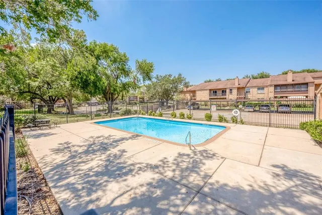 a view of a house with a swimming pool