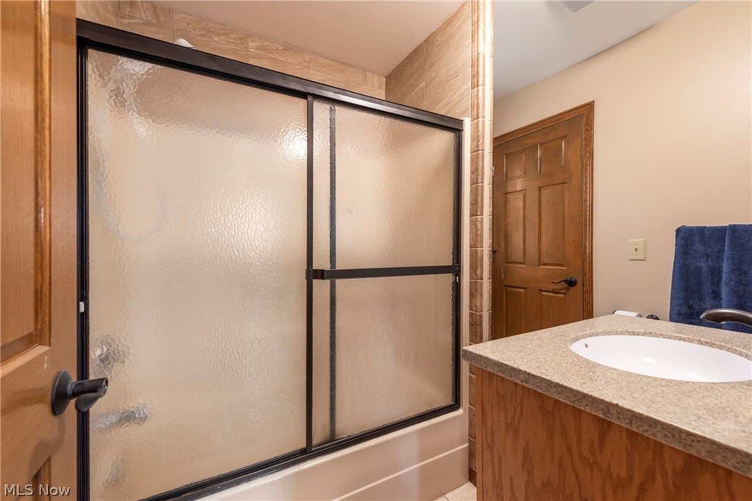 9990 Broadview Road Broadview Heights, OH 44147 - Photo 24 of 47 Full bath featuring shower / bath combination with glass door and vanity