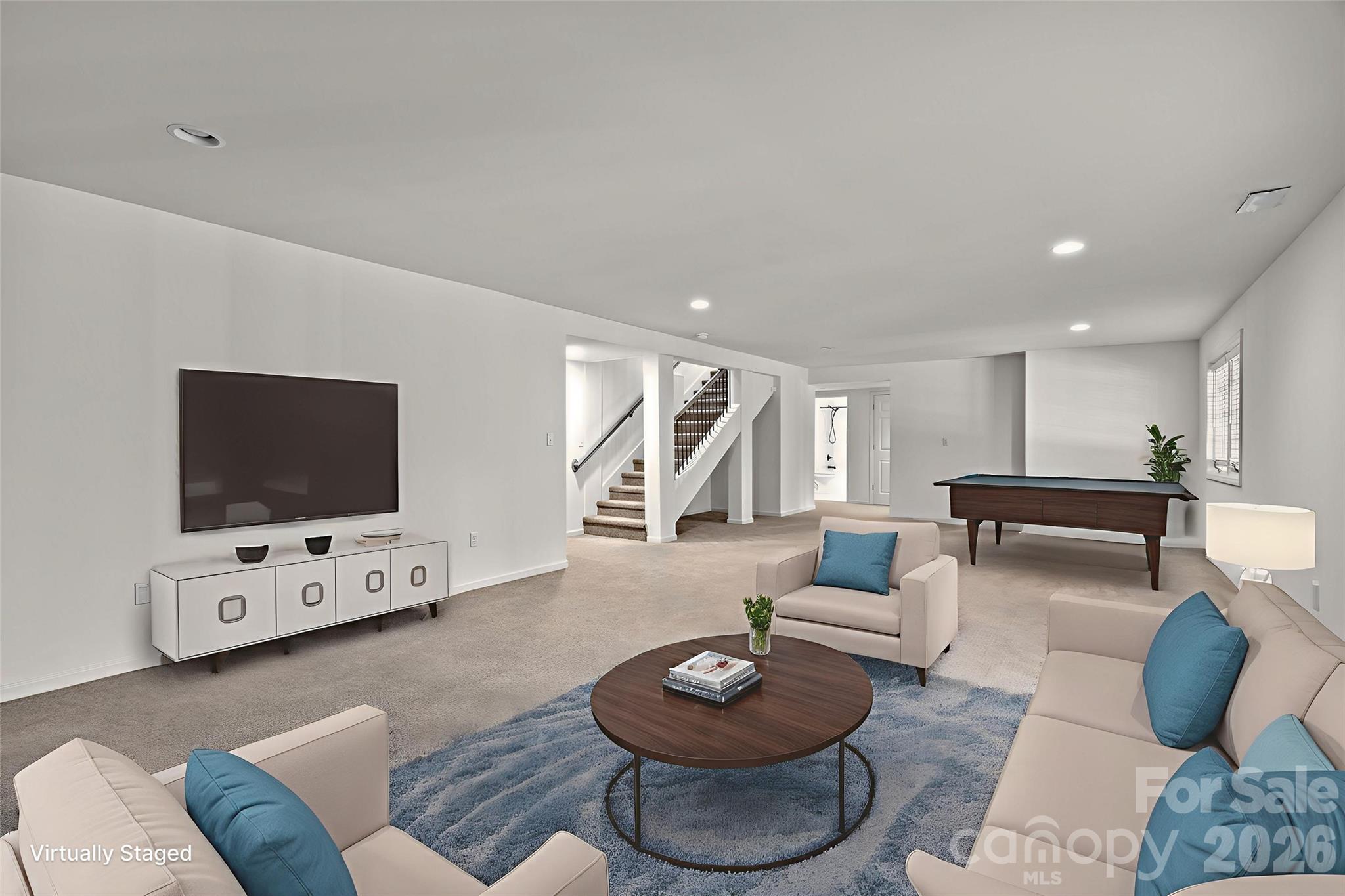 1 Sweetbriar Court Greer, SC 29650 - Photo 31 of 48 a living room with furniture and a flat screen tv