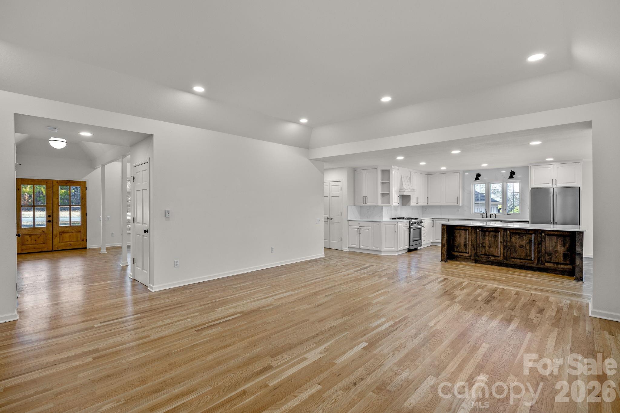 1 Sweetbriar Court Greer, SC 29650 - Photo 10 of 48 a view of kitchen with kitchen island and wooden floor