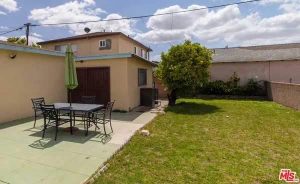 a house view with a outdoor space