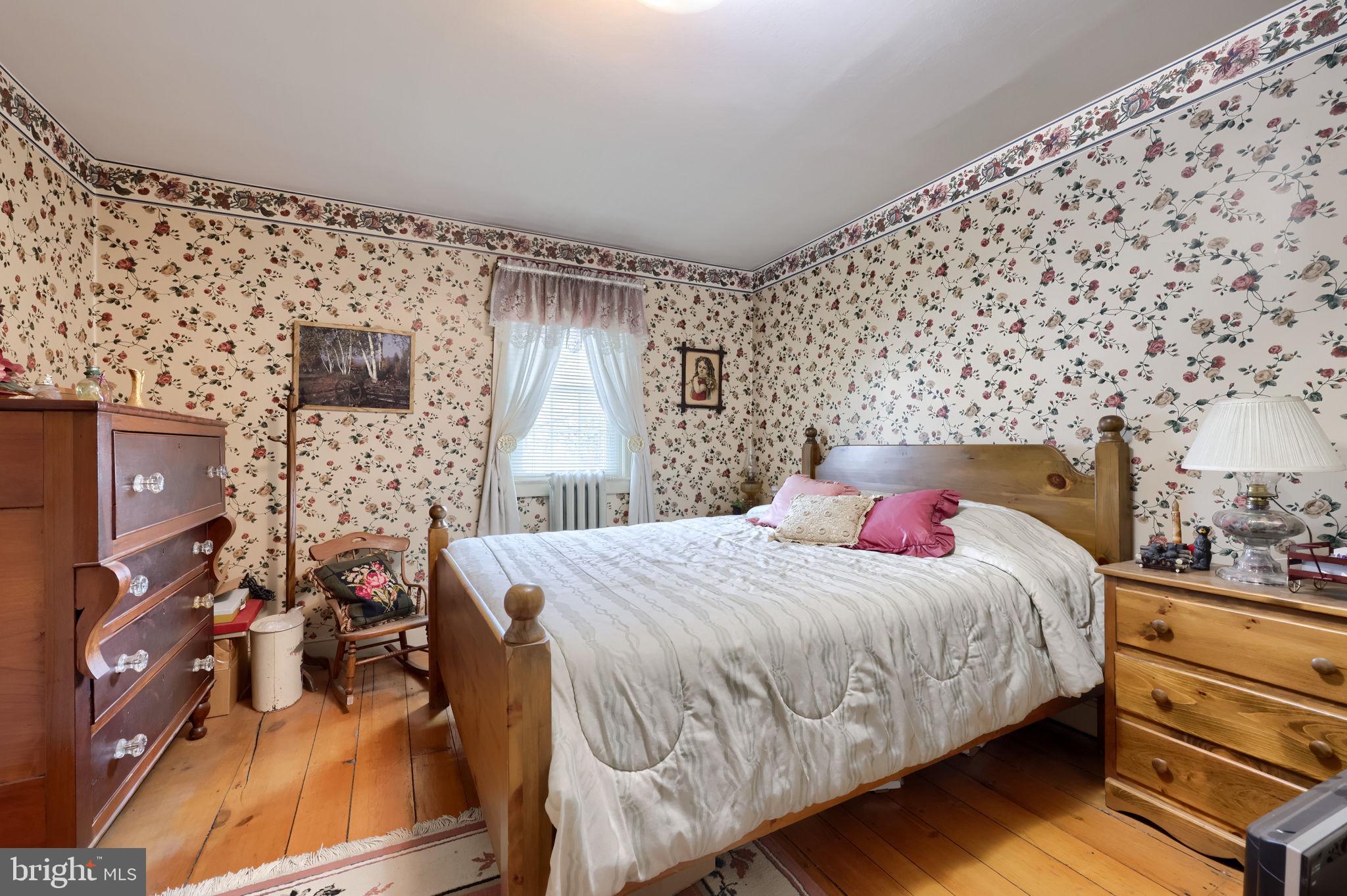 430 Stehman Road Lancaster, PA 17603 - Photo 14 of 43 a bedroom with a bed and wooden floor