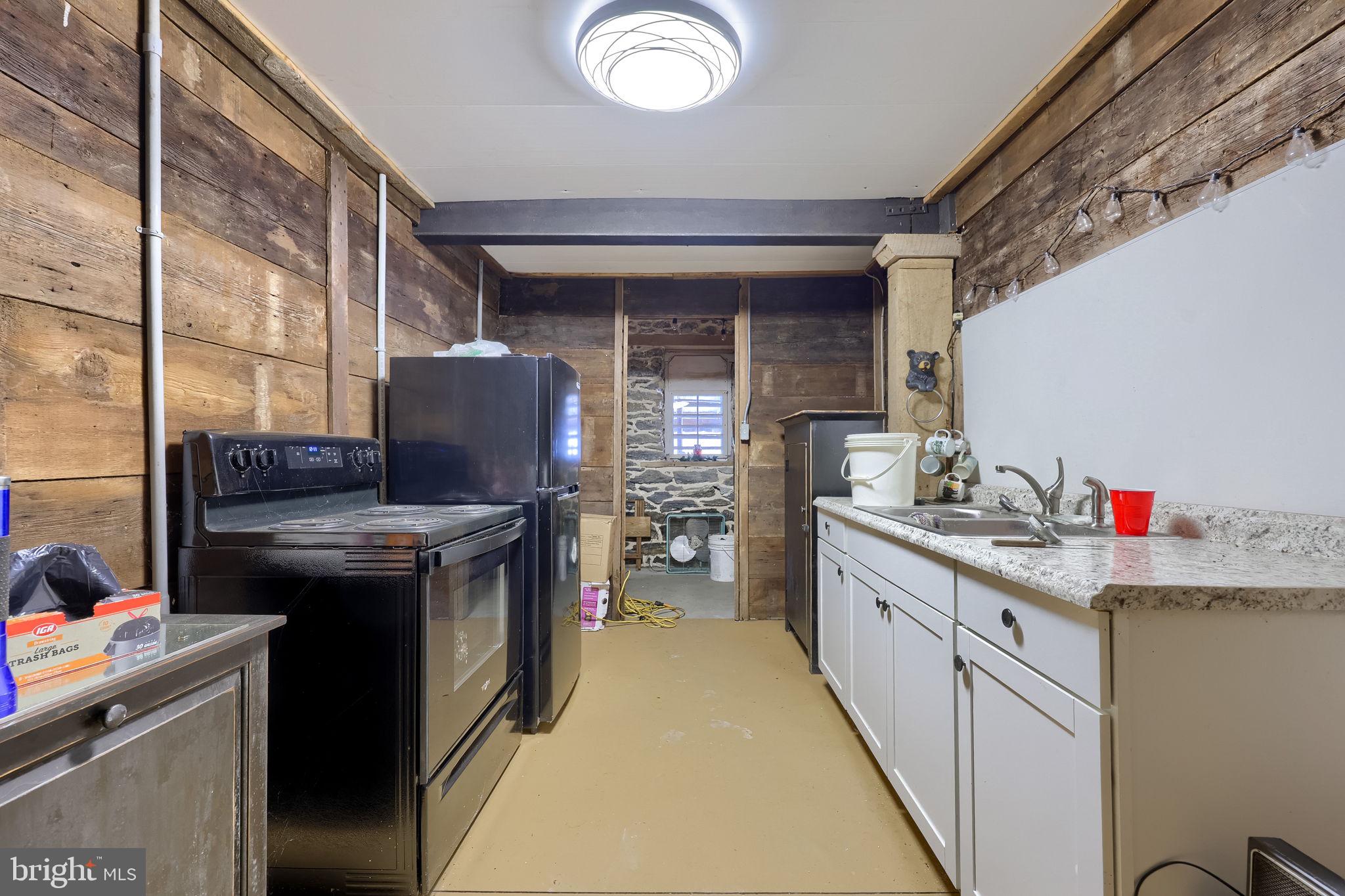 430 Stehman Road Lancaster, PA 17603 - Photo 24 of 43 a kitchen with a stove and a sink