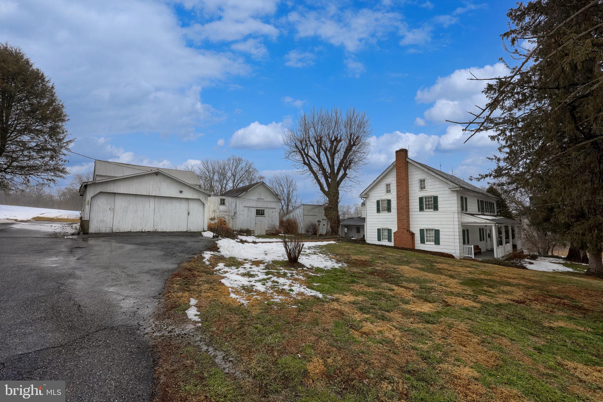 430 Stehman Road Lancaster, PA 17603 - Photo 34 of 43 a large white house with a large tree in front of it