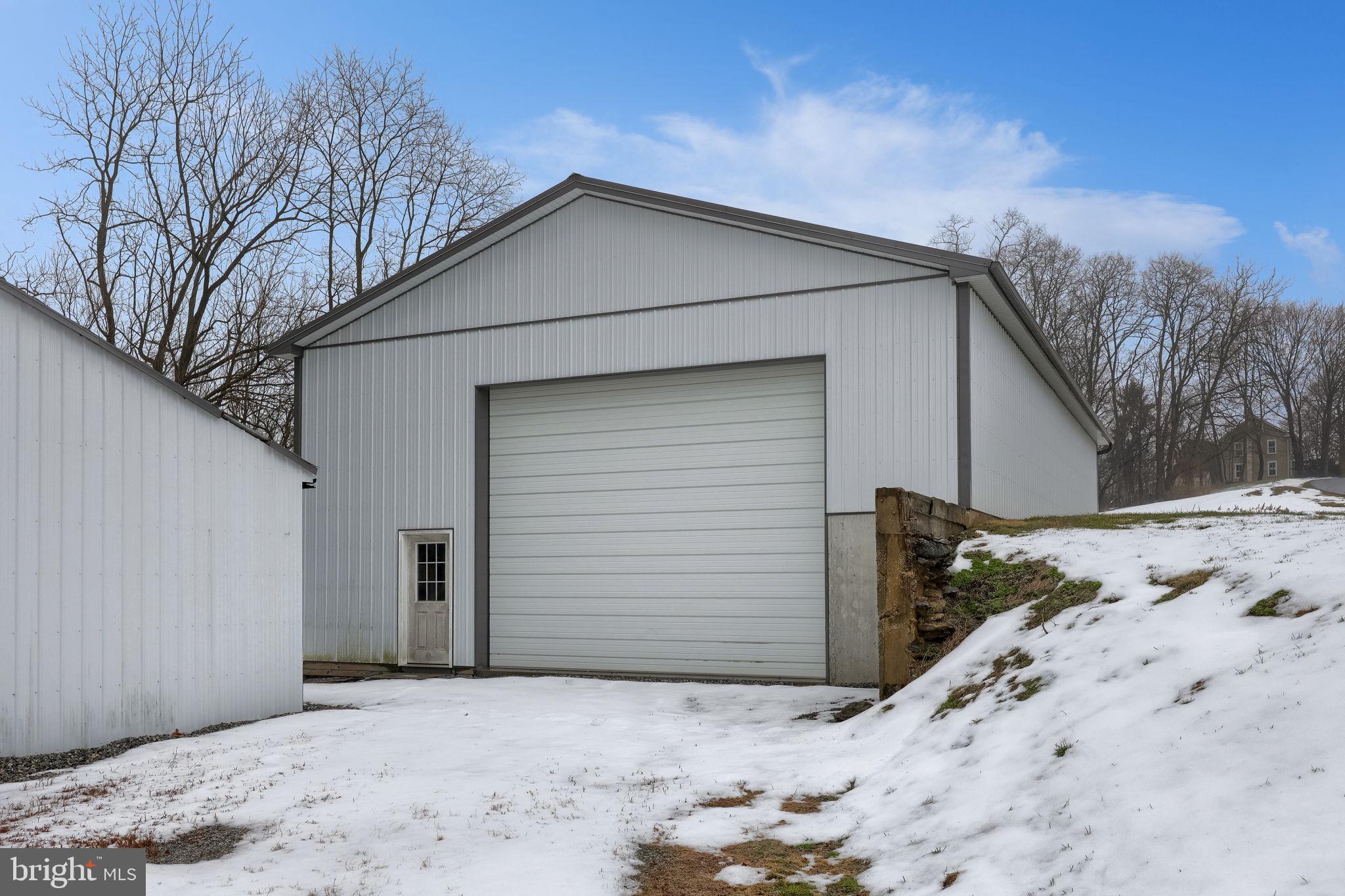430 Stehman Road Lancaster, PA 17603 - Photo 36 of 43 a view of white house with a snow on the road