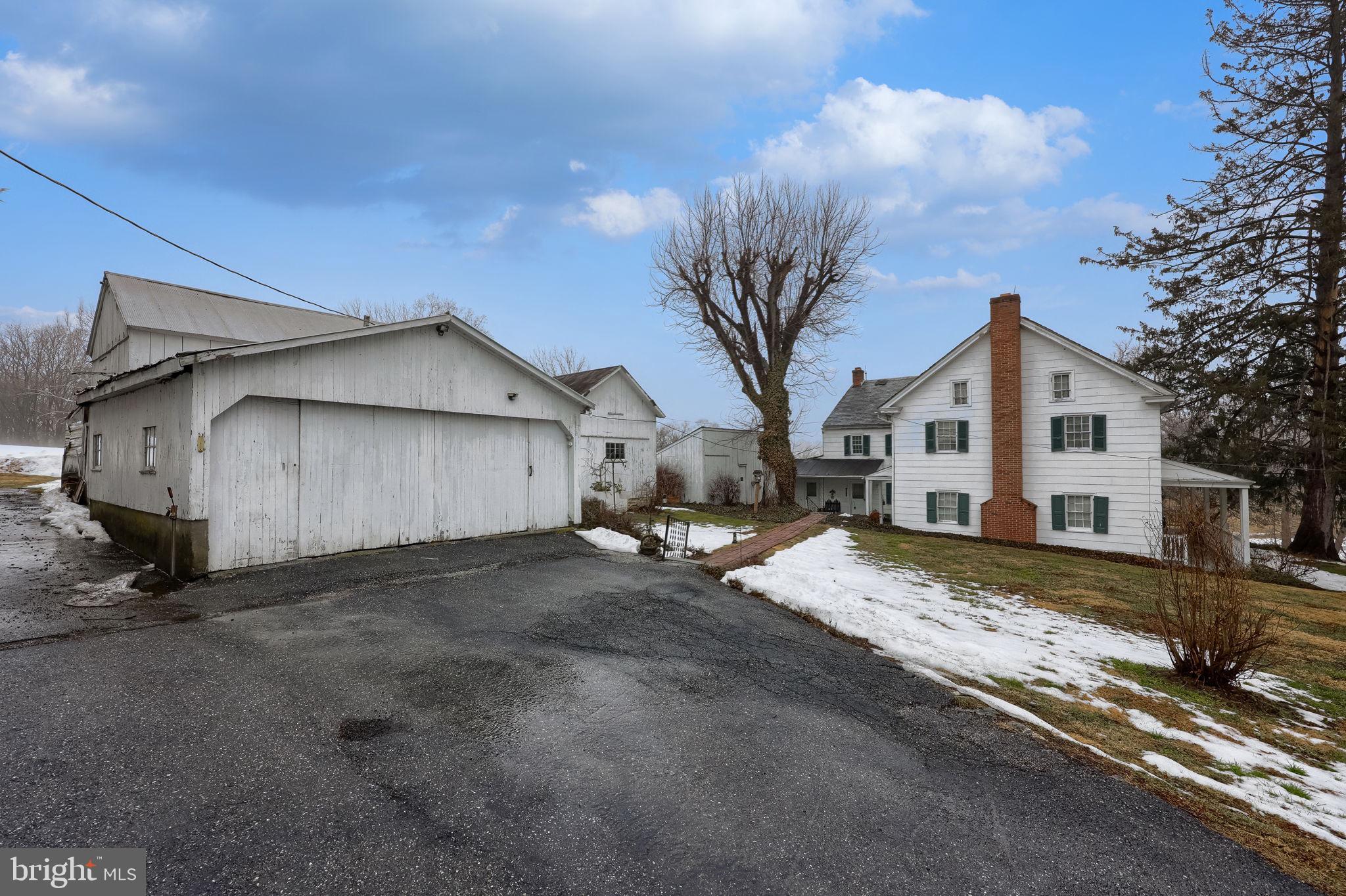 430 Stehman Road Lancaster, PA 17603 - Photo 39 of 43 a view of a house with a yard and garage