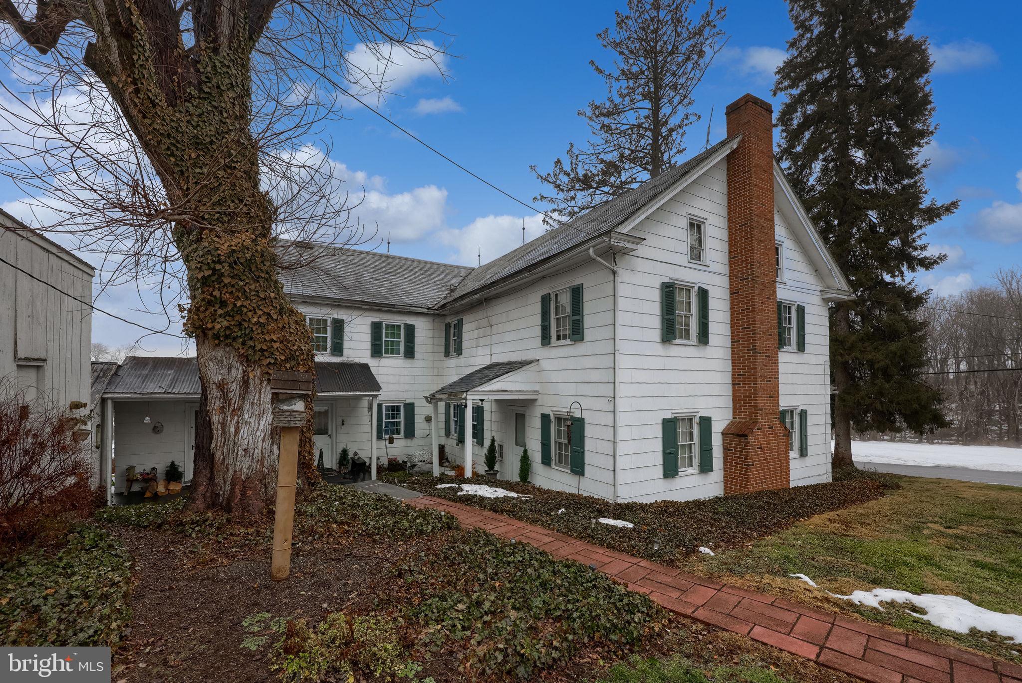 430 Stehman Road Lancaster, PA 17603 - Photo 43 of 43 a view of a white house that has a tree in front of it