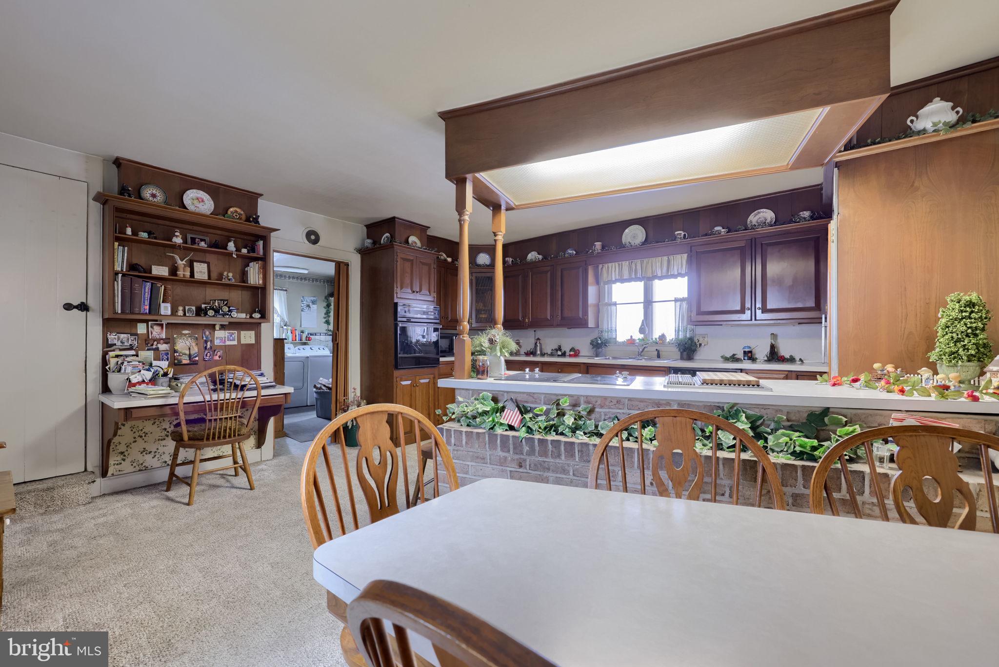 430 Stehman Road Lancaster, PA 17603 - Photo 9 of 43 a view of a dining room with furniture window and wooden floor