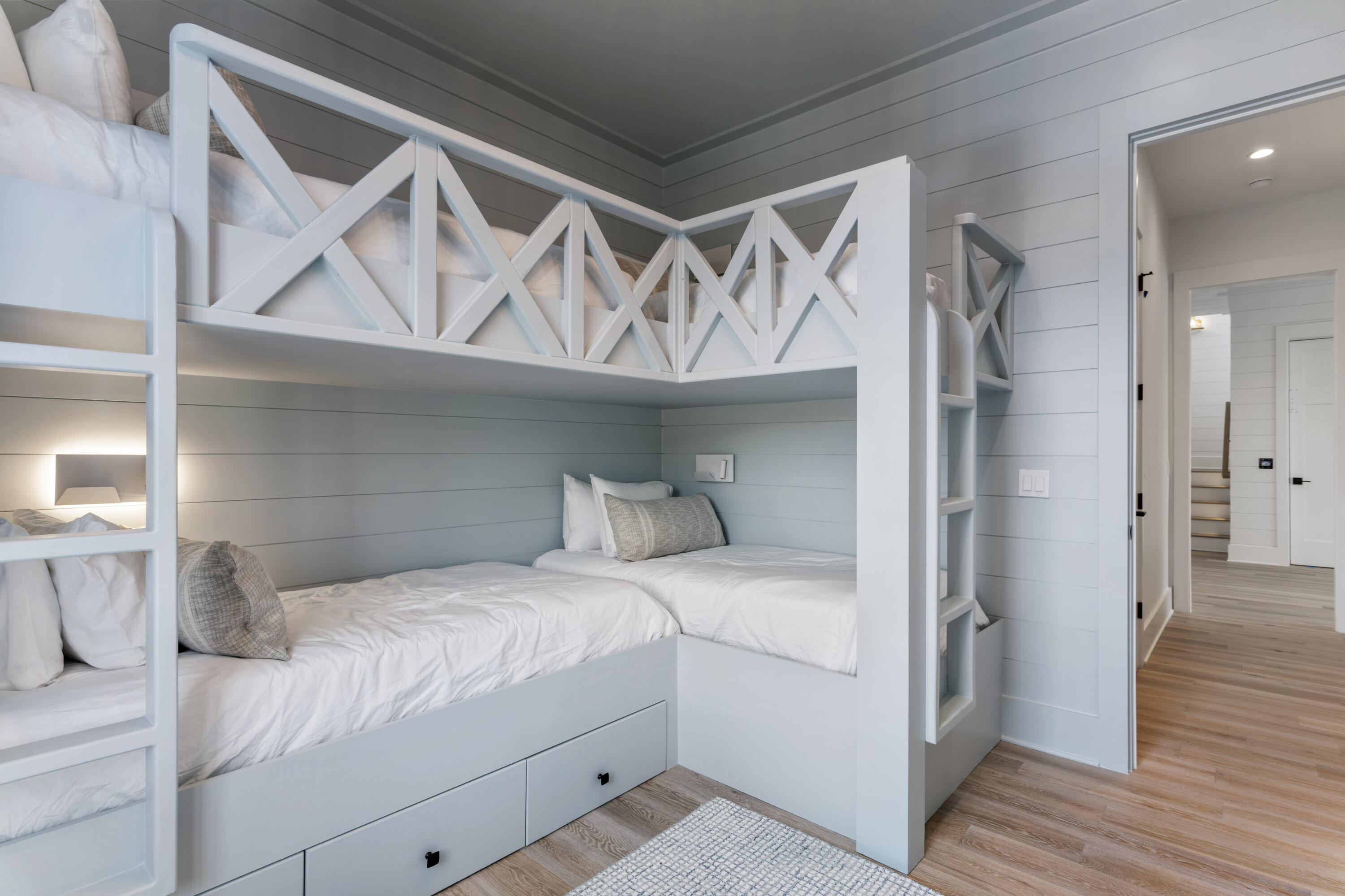 140 South Wall Street Inlet Beach, FL 32461 - Photo 33 of 53 a bedroom with a bed and a mirror