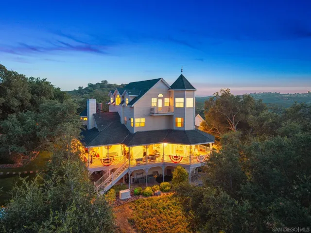 a front view of a building with retail area and sign board